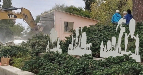 The walls come tumbling down ... demolition of the building in December 2019